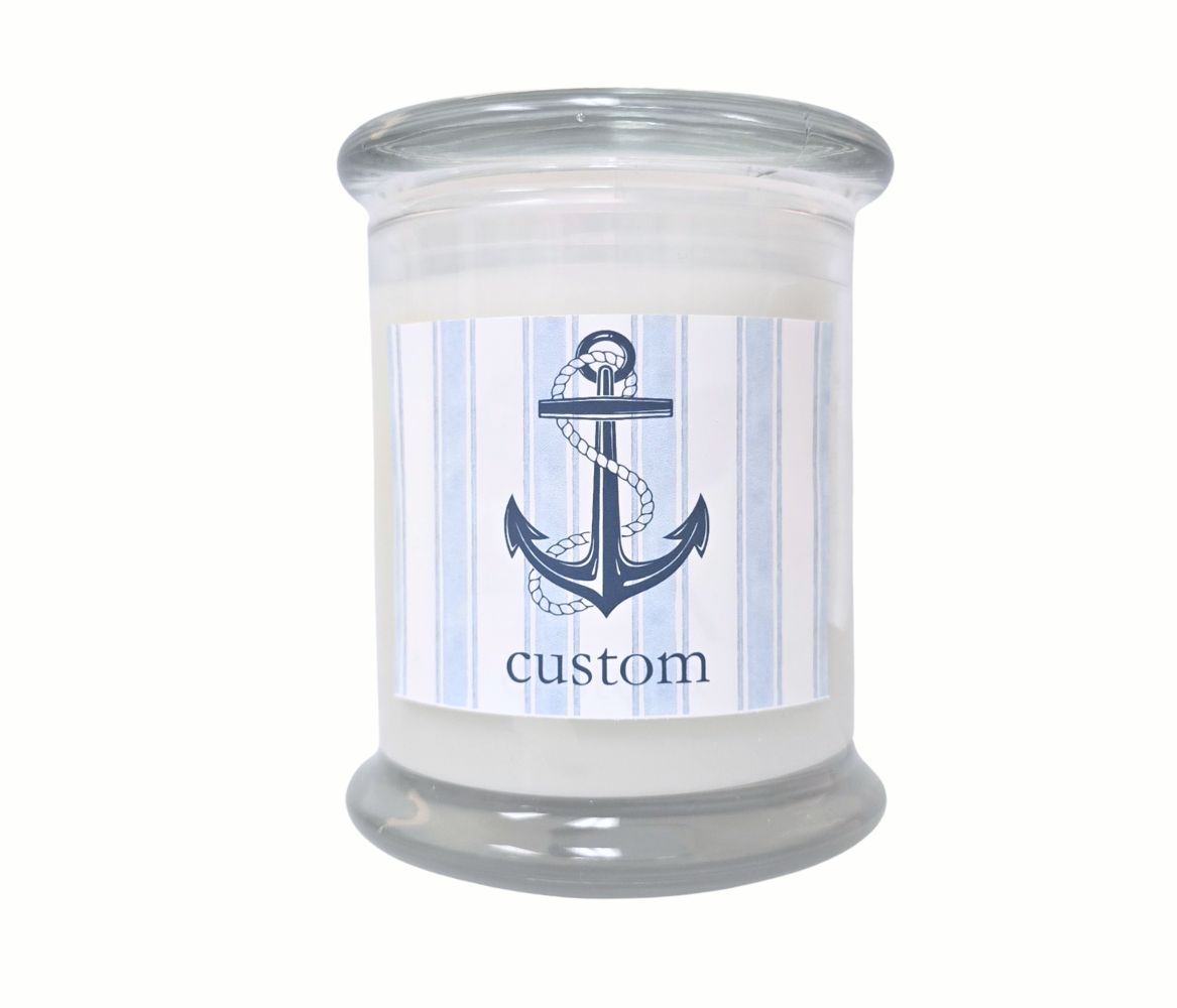 Personalized 12oz coastal candle with blue stripes and anchor icon, custom beach town label, hand-poured in eco-friendly coconut wax