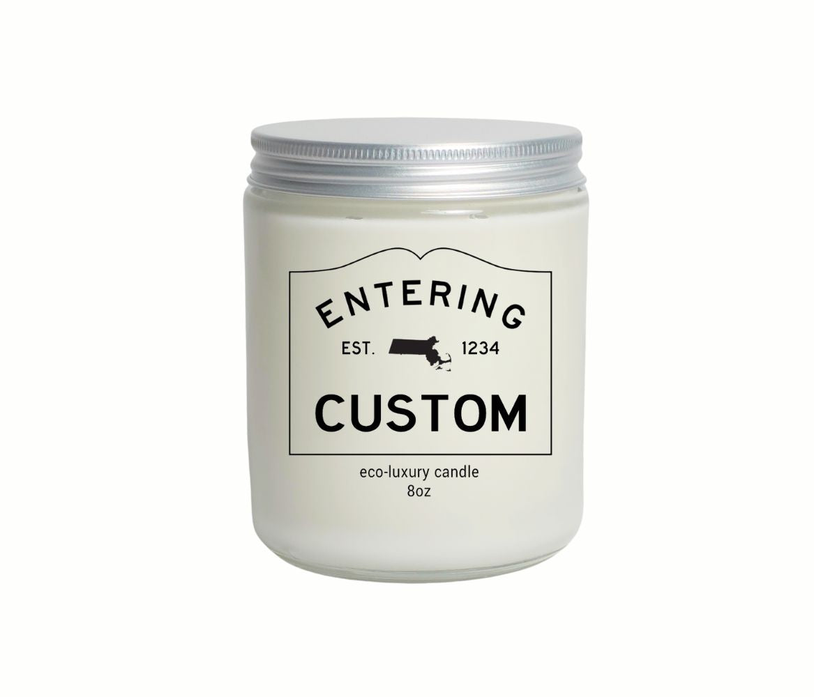 Custom 8oz “Entering” town candle with personalized label and state silhouette, hand-poured in eco-friendly coconut wax