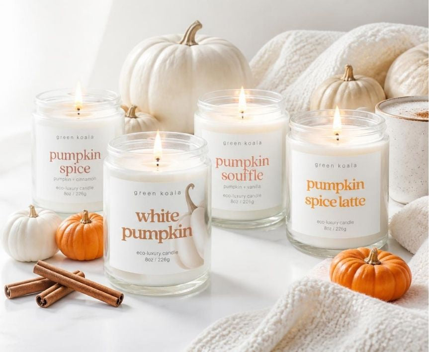 Four Green Koala pumpkin candles with white pumpkins and cinnamon sticks