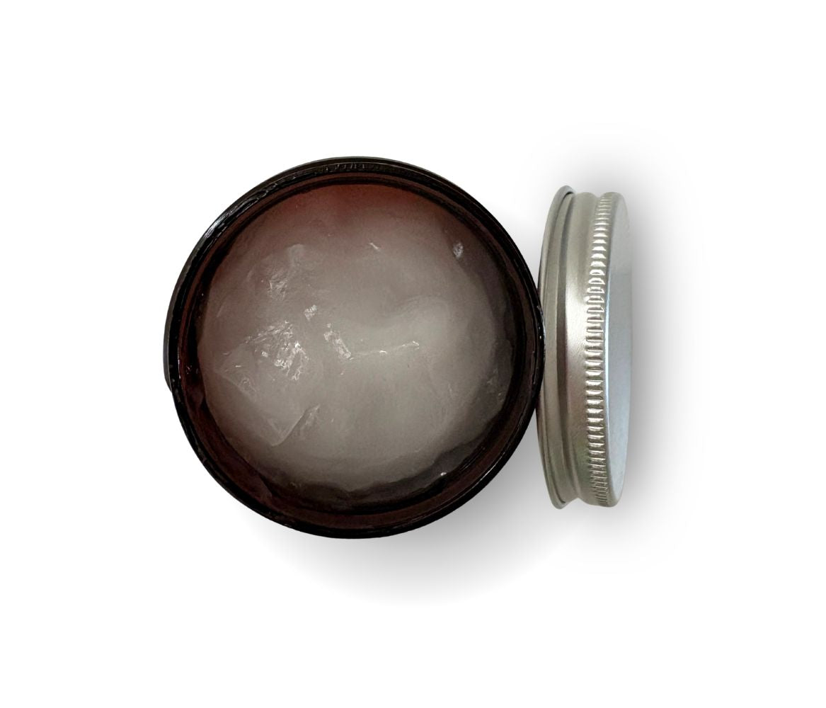 Open container of cooling gel showing thin white gel.