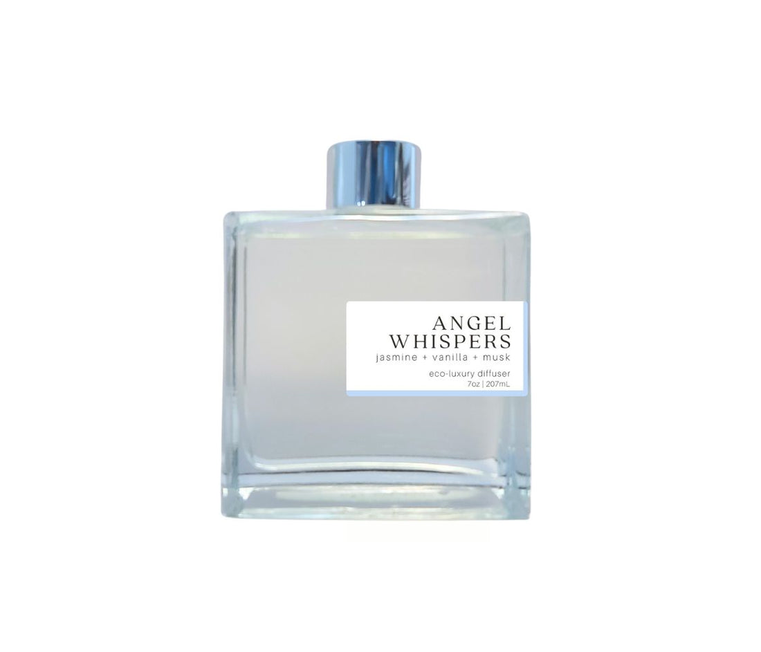 Green Koala Angel Whispers reed diffuser in a clear glass bottle with silver cap, creating a long-lasting, calming scent in any room.