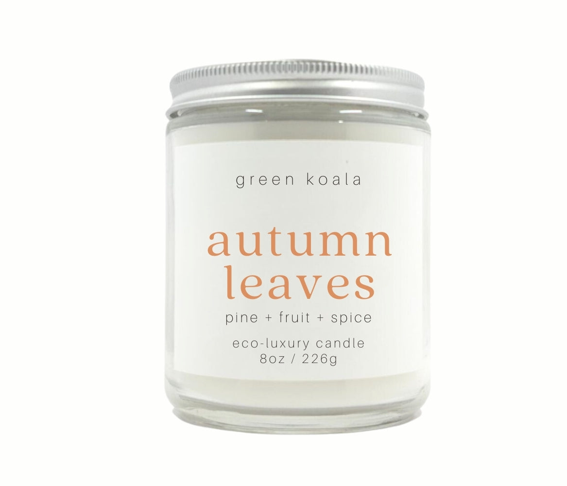 8oz Autumn Leaves non-toxic candle in a glass jar with silver lid and made with coconut wax.