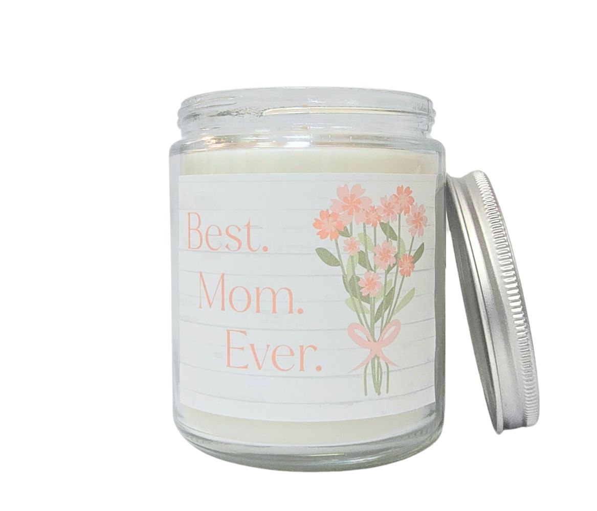 Eco-luxury 8oz candle labeled Best Mom Ever with silver lid and floral bouquet design, ideal for Mother’s Day gifting.