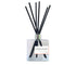 Citrus Burst reed diffuser in a glass bottle with black reeds, delivering a fresh, zesty fragrance for a bright, invigorating atmosphere.