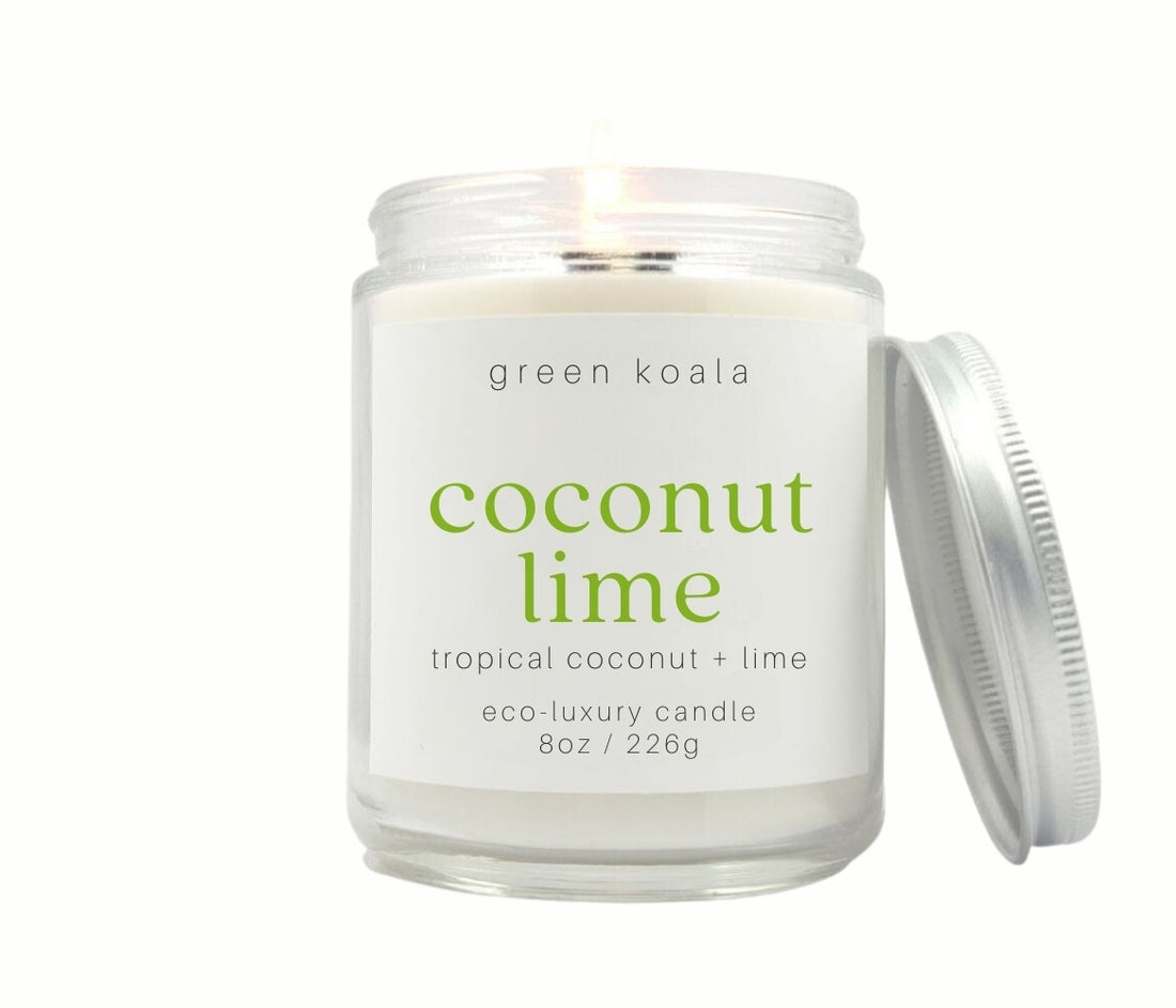 8oz Coconut Lime scented non-toxic and clean burning candle in a glass jar with silver lid.