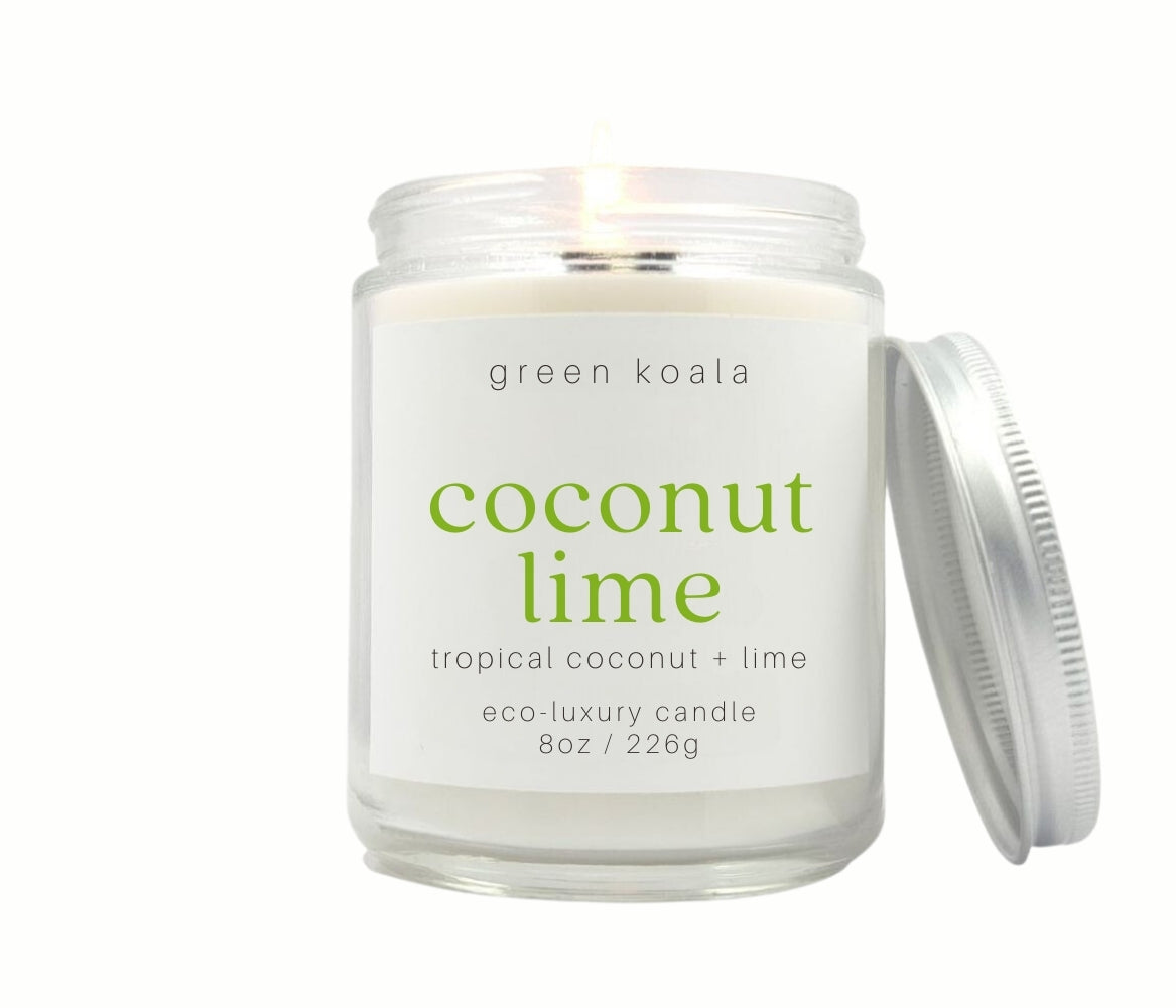 8oz Coconut Lime scented non-toxic and clean burning candle in a glass jar with silver lid.