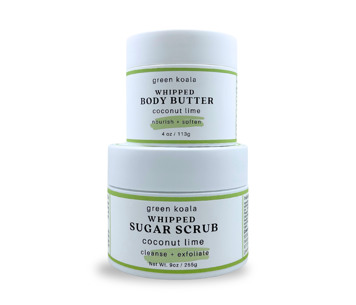 Two jars of green koala coconut lime whipped body butter and sugar scrub on a white background