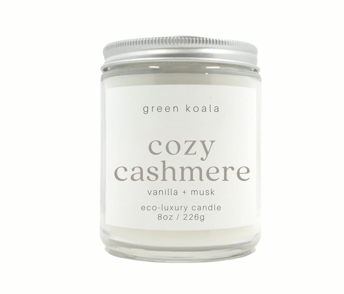 8oz Coastal Calm scented non-toxic hand poured candle in a glass jar with silver lid.