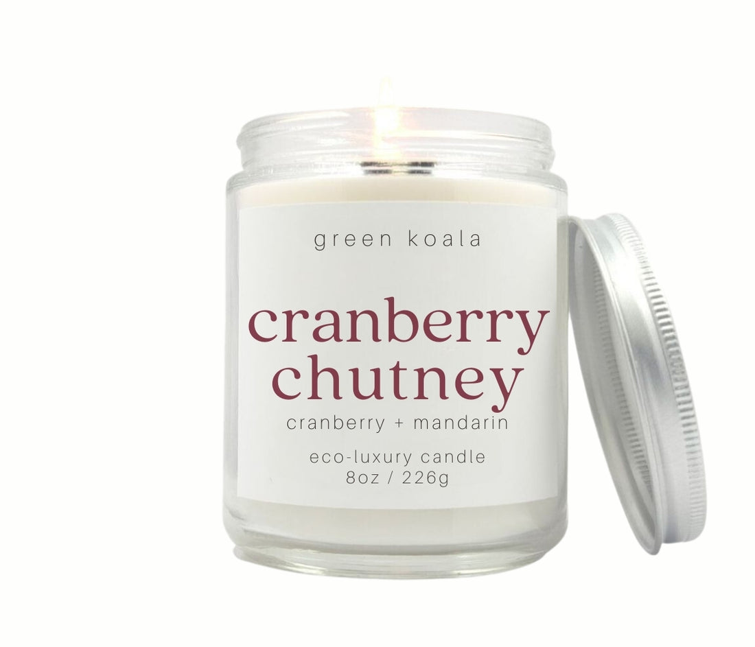 8oz Cranberry Chutney scented non-toxic and clean burning candle in a glass jar with silver lid.