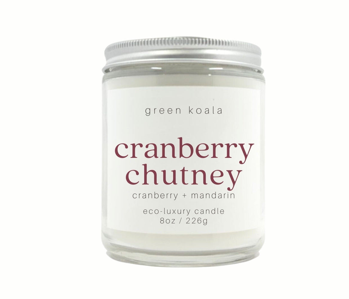 8oz Cranberry Chutney scented non-toxic hand poured candle in a glass jar with silver lid.