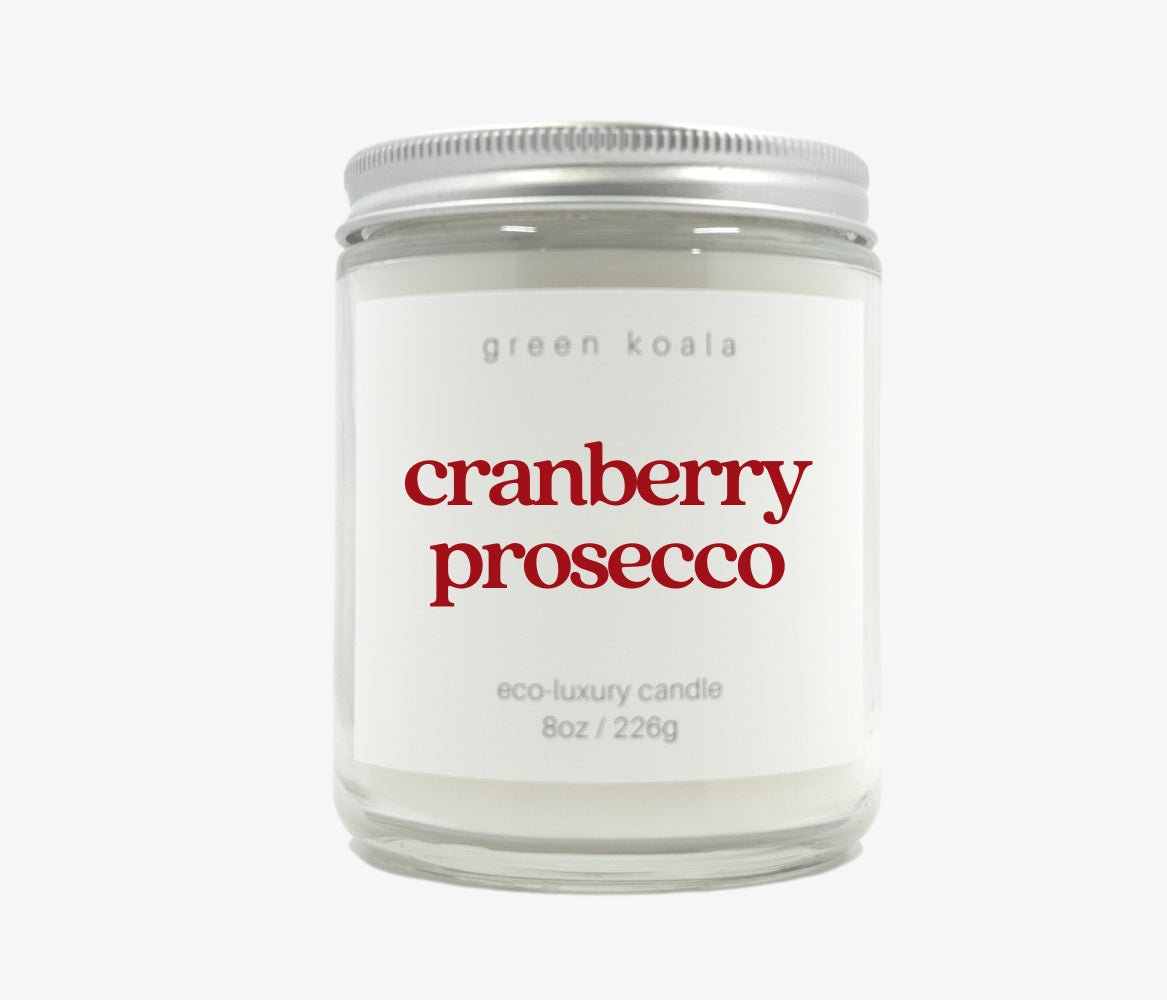 Green Koala Cranberry Prosecco 8 oz. candle with lid on