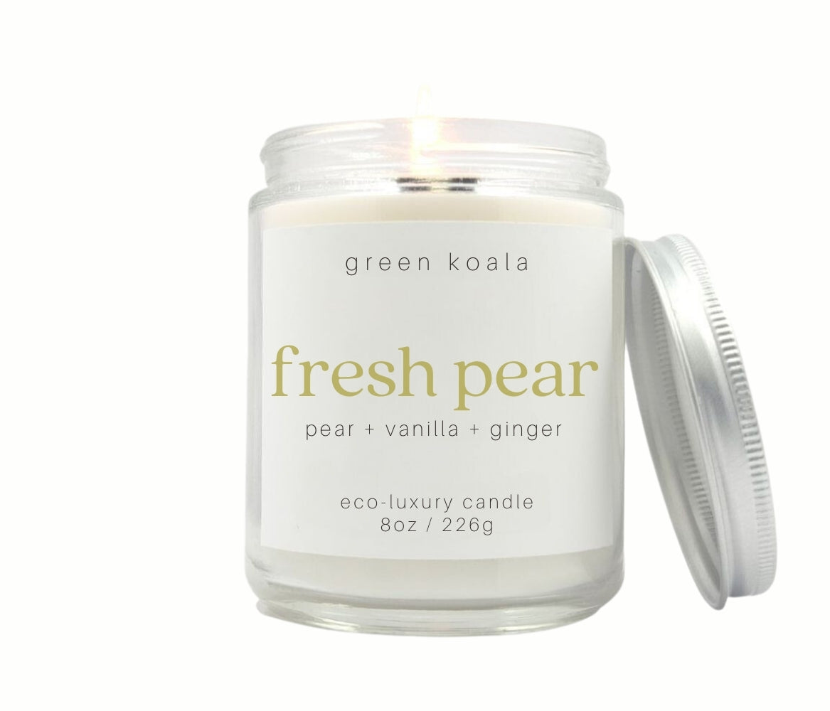 8oz Fresh Pear scented non-toxic and clean burning candle in a glass jar with silver lid.