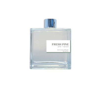 Fresh Pine 7oz non-toxic scented reed diffuser in glass jar.