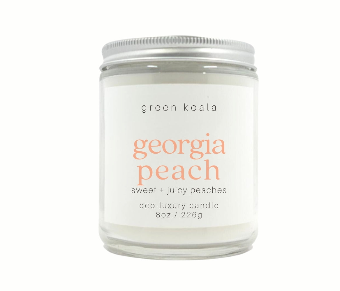 8oz Georgia Peach scented non-toxic hand poured candle in a glass jar. Made in the USA.