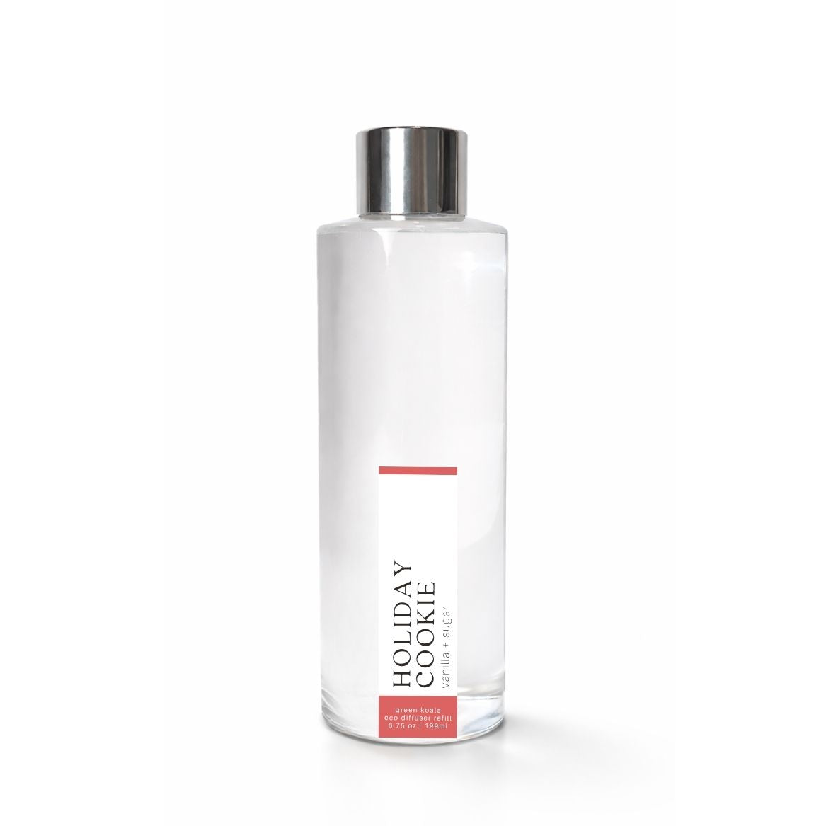 Clear bottle with silver cap labeled Holiday Cookie on a white background