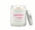 8oz Jasmine + Rose scented non-toxic and clean burning candle in a glass jar.