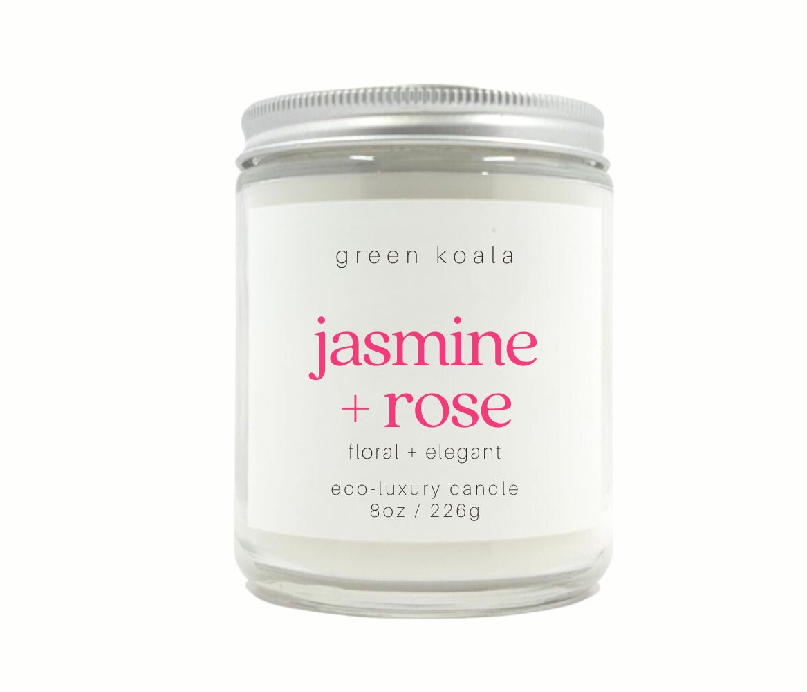 8oz Jasmine + Rose scented non-toxic hand poured candle in a glass jar.
