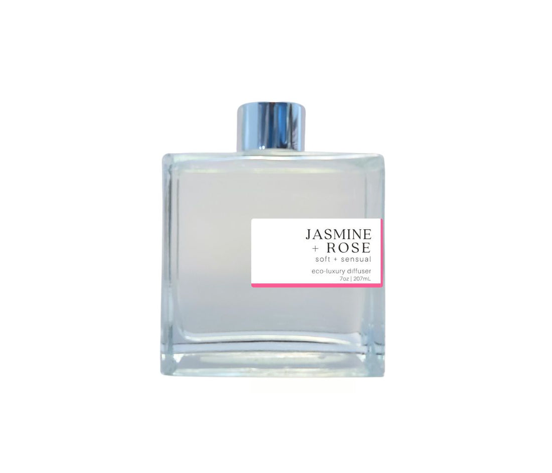 Green Koala Jasmine Rose reed diffuser in a clear glass bottle with silver cap, filling your space with a long-lasting floral scent.