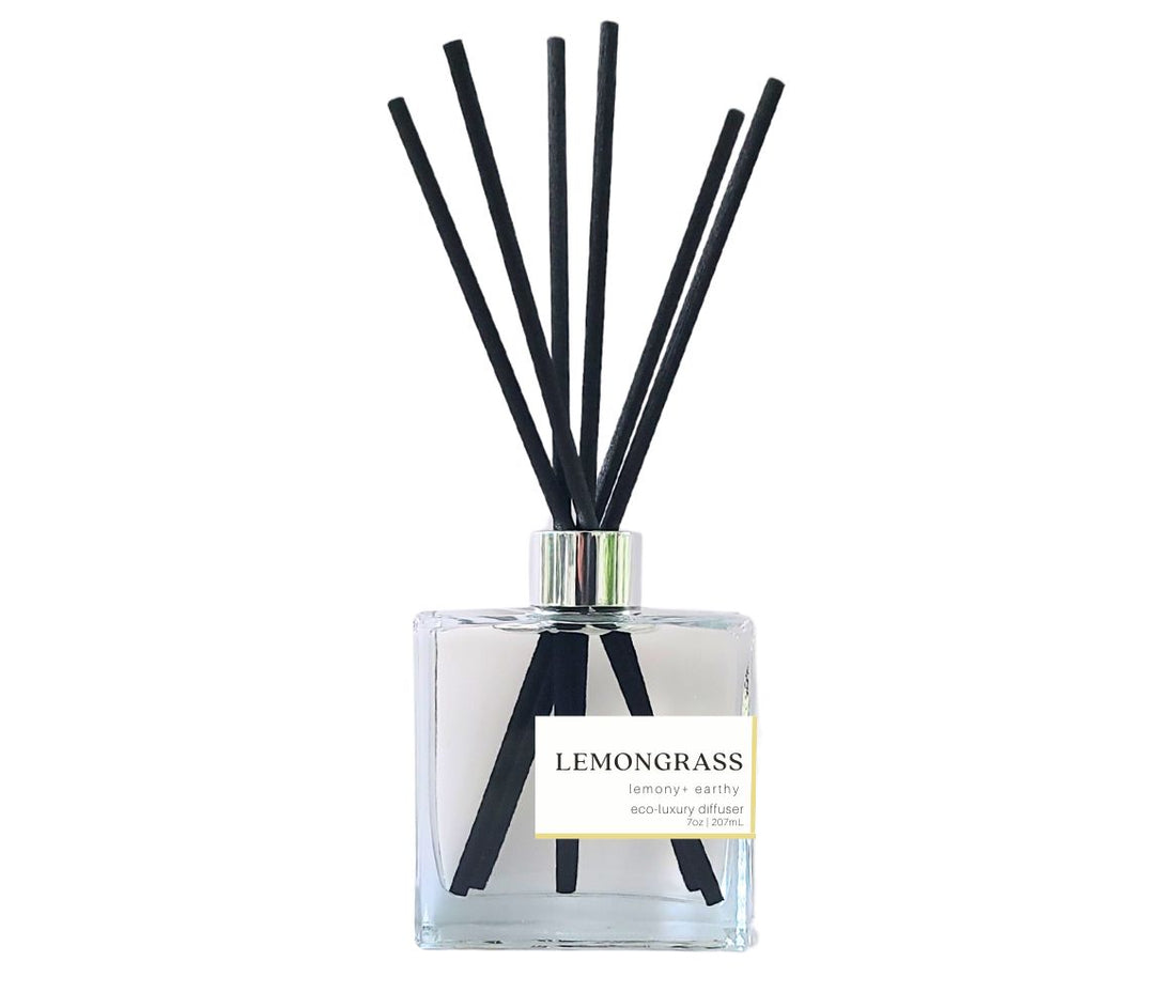 Green Koala Lemongrass reed diffuser with black reeds in a glass bottle, perfect for bringing a fresh, citrusy fragrance into your home.