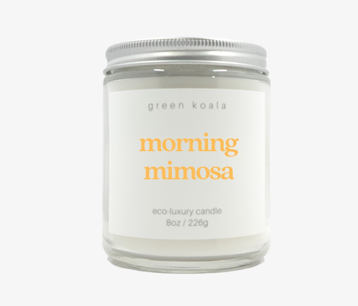Morning mimosa candle in an 8oz jar with silver lid