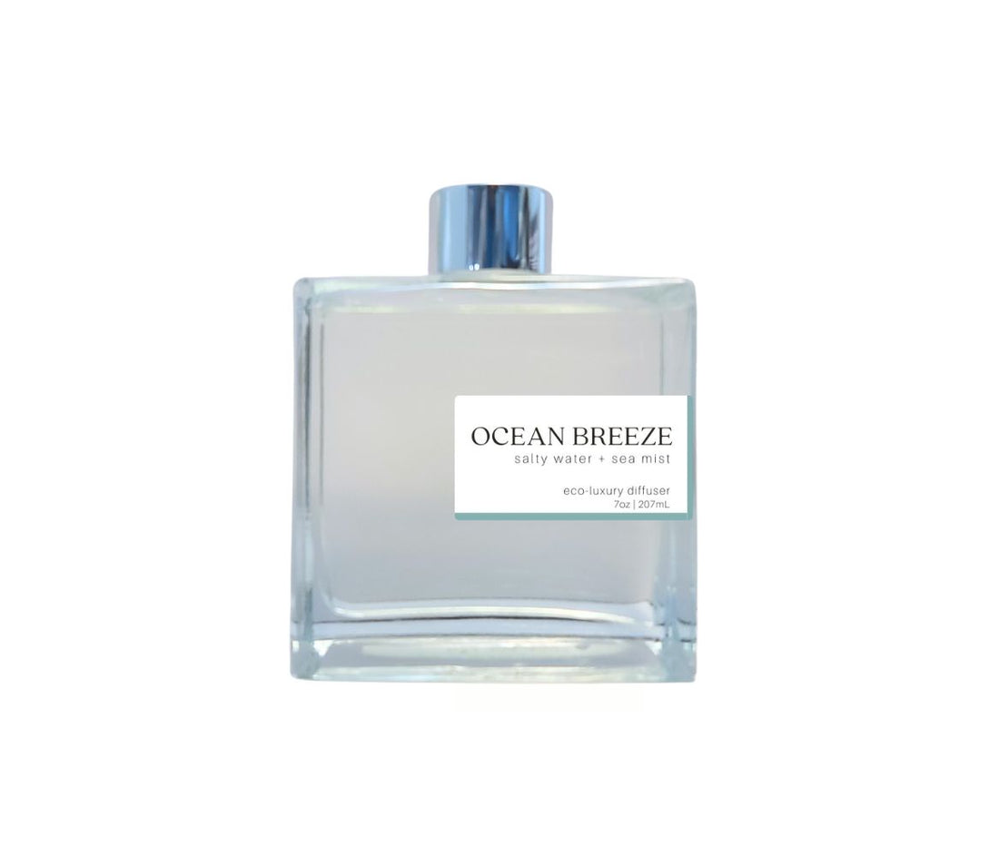 Ocean Breeze diffuser with silver cap in a glass bottle, evoking a refreshing, coastal breeze for your home.