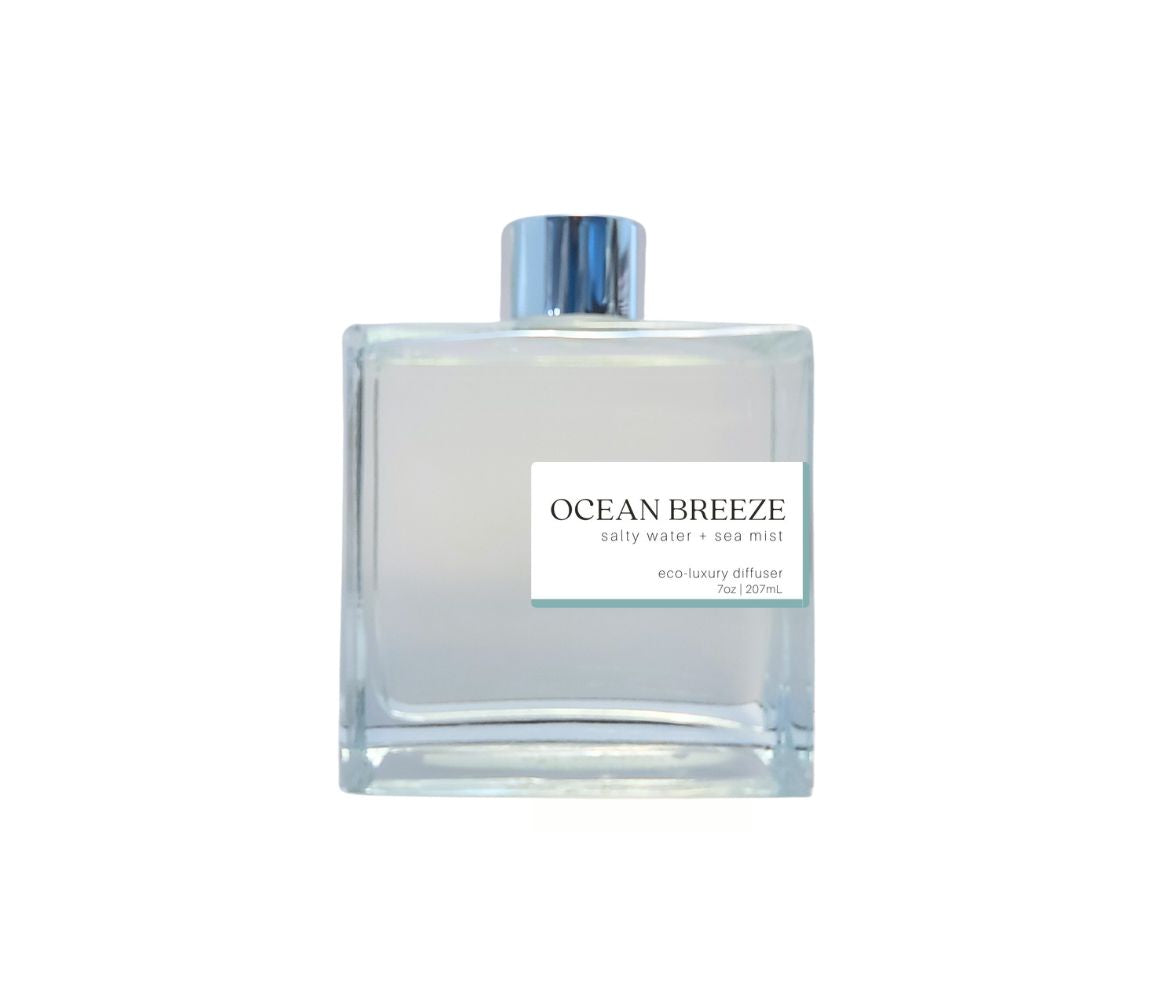 Ocean Breeze diffuser with silver cap in a glass bottle, evoking a refreshing, coastal breeze for your home.