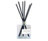 Ocean mist reed diffuser in a glass bottle with black reeds, bringing a fresh, coastal breeze to your space.