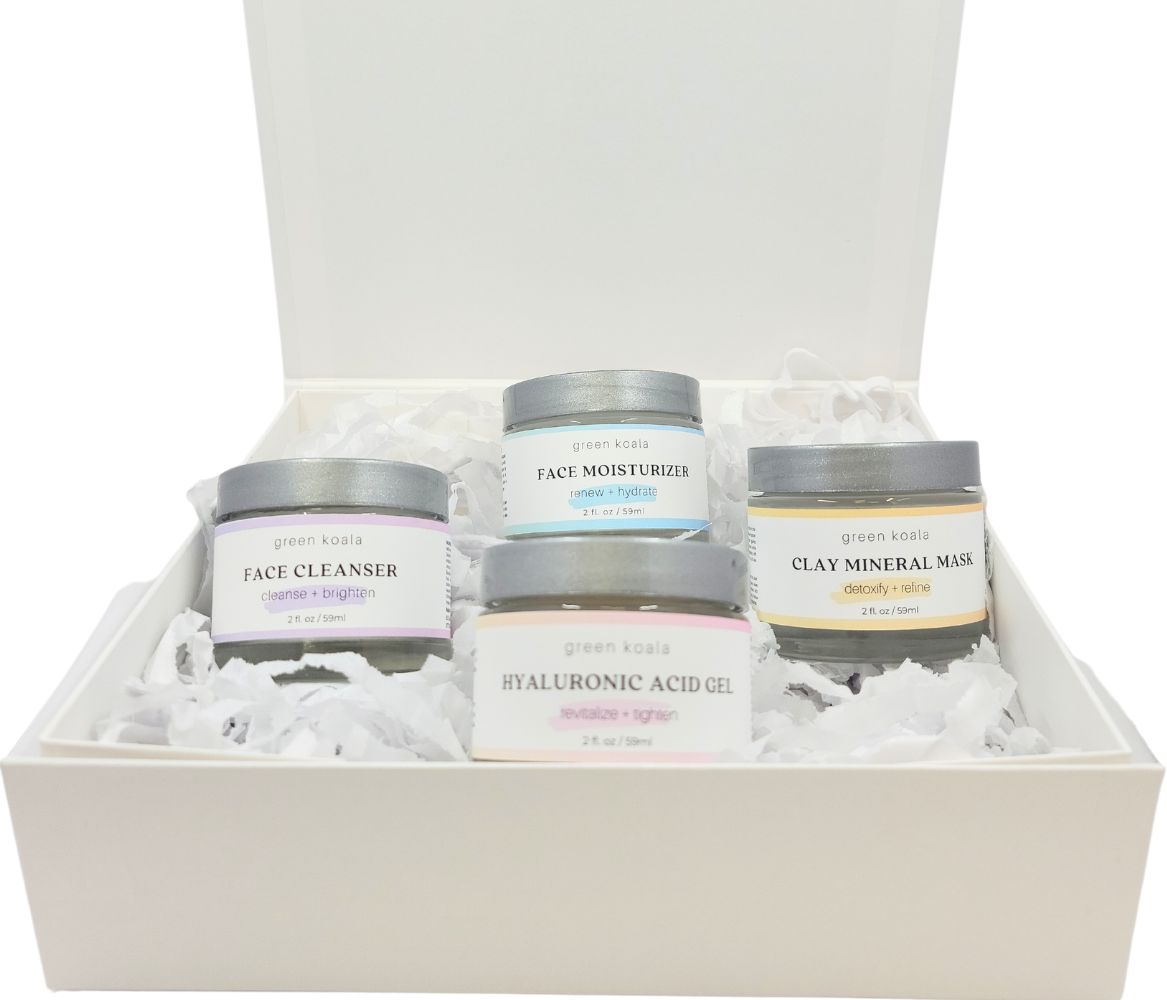 A gift box Face Care Gift Set in a box includes moisturizer, cleanser, hyaluronic acid gel and clay mask.