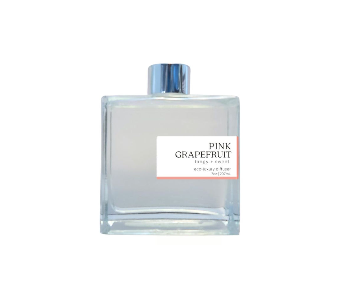 Green Koala Pink Grapefruit reed diffuser in a stylish glass bottle with silver cap, bringing a natural, refreshing fragrance to your home.