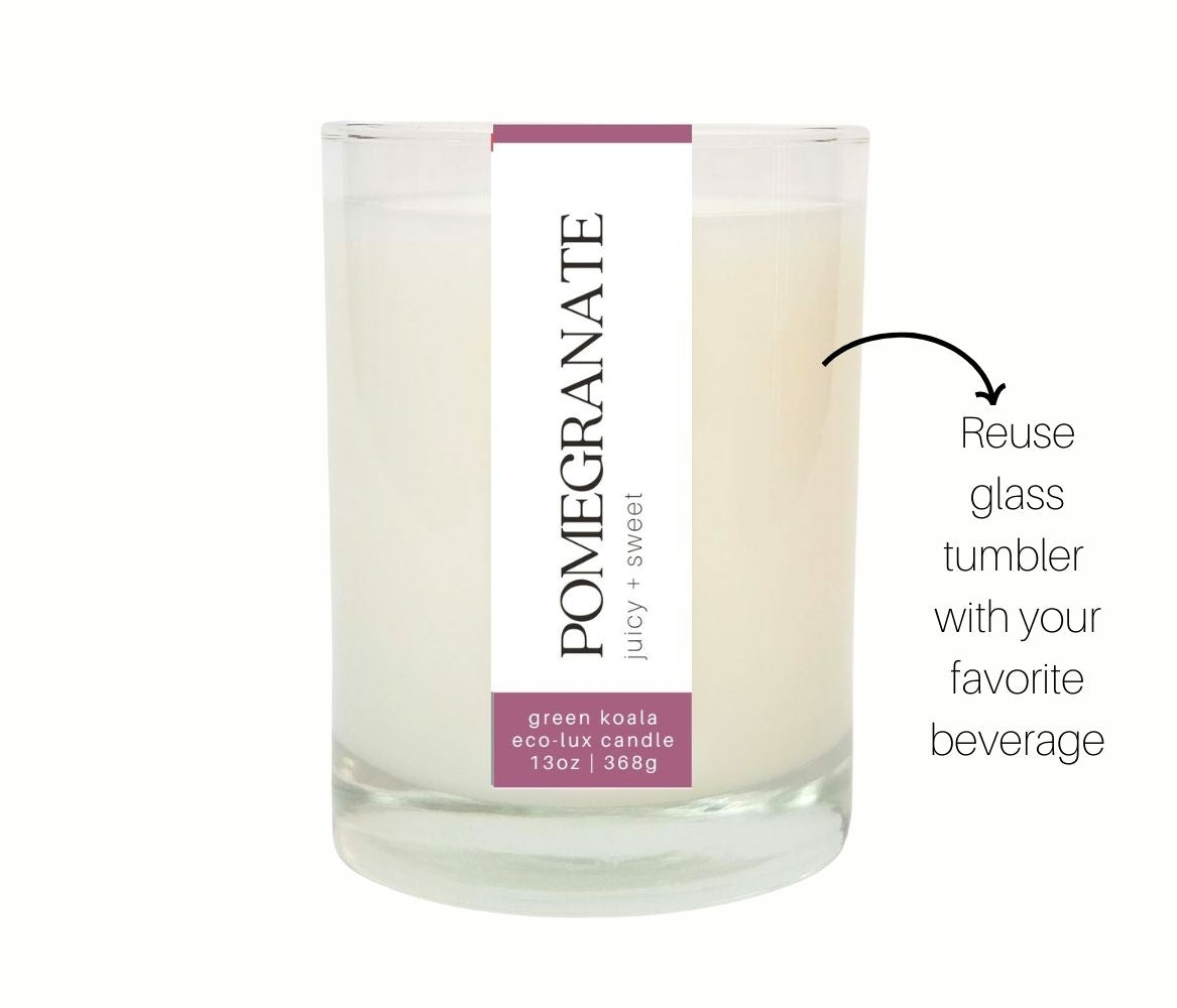 13oz Green Koala Pomegranate zero waste candle in a drinking glass