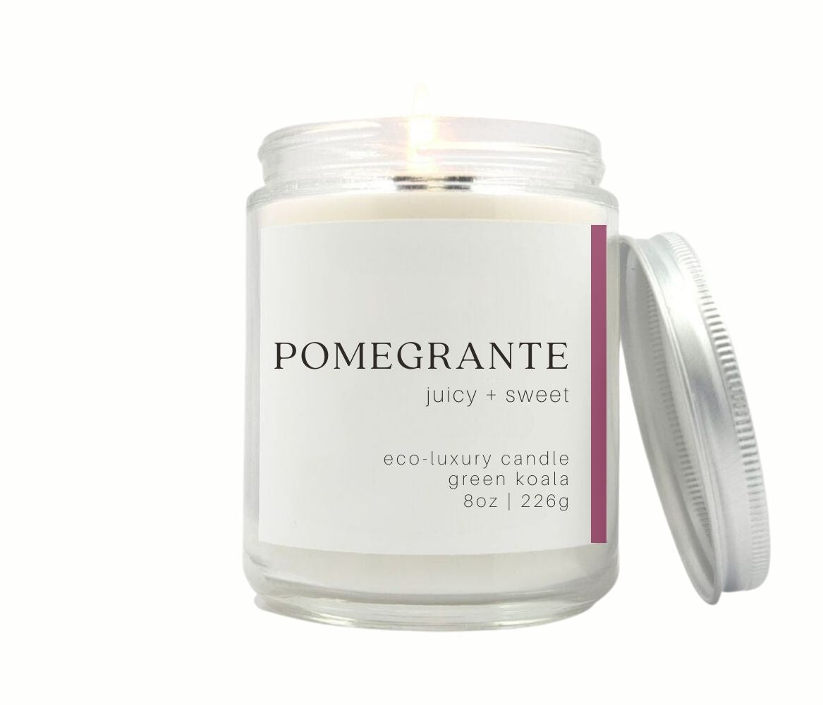 8oz Green Koala Pomegranate eco-lux candle in a glass jar with lid. non-toxic and clean burning.