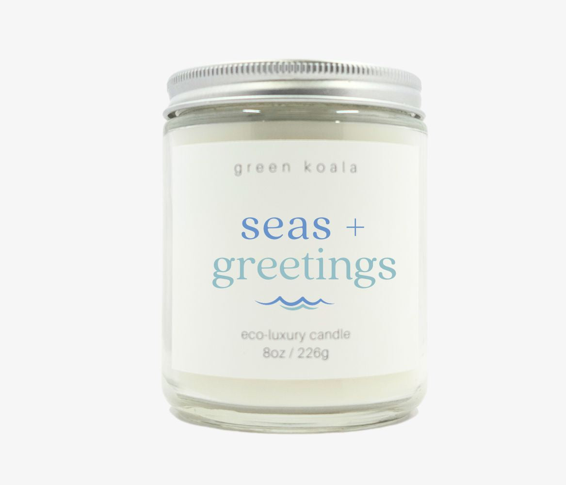 8oz Seas + Greetings Eco-Luxury Candle in an ocean scent in glass jar with cap. Better than soy! Made with coconut wax.
