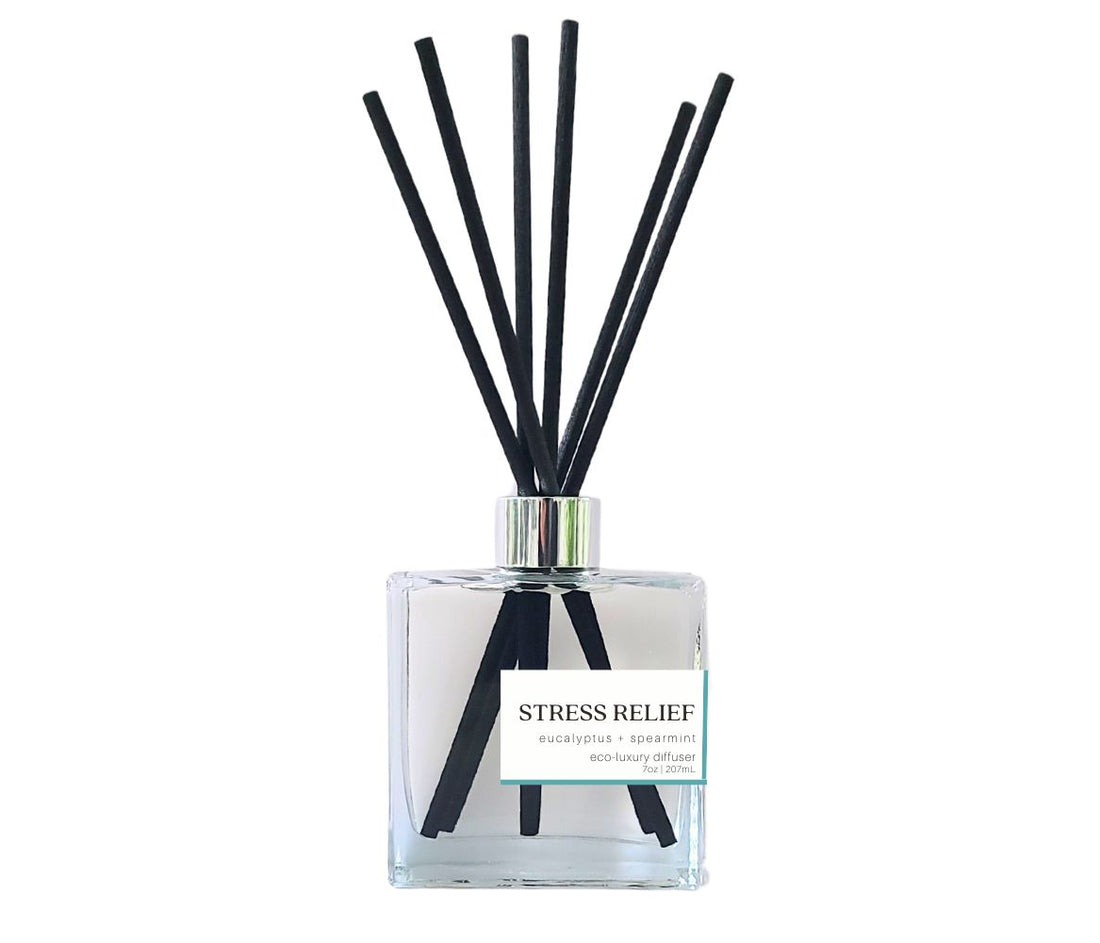 Stress Relief reed diffuser by Green Koala in a glass bottle with black reeds, filling your space with a peaceful, calming fragrance.