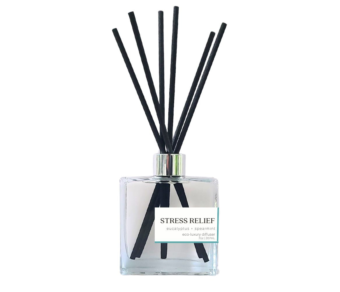 Stress Relief reed diffuser by Green Koala in a glass bottle with black reeds, filling your space with a peaceful, calming fragrance.