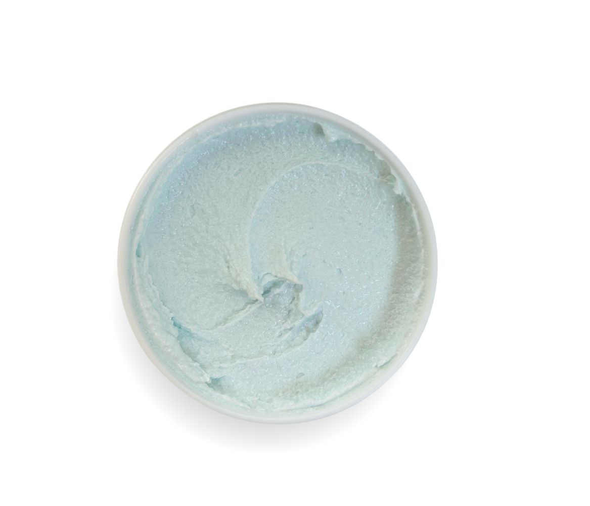 Top-down view of 9oz Stress Relief Body Scrub jar showcasing whipped texture and soothing herbal-minty aroma, cleanses, exfoliates, and deeply hydrates skin.