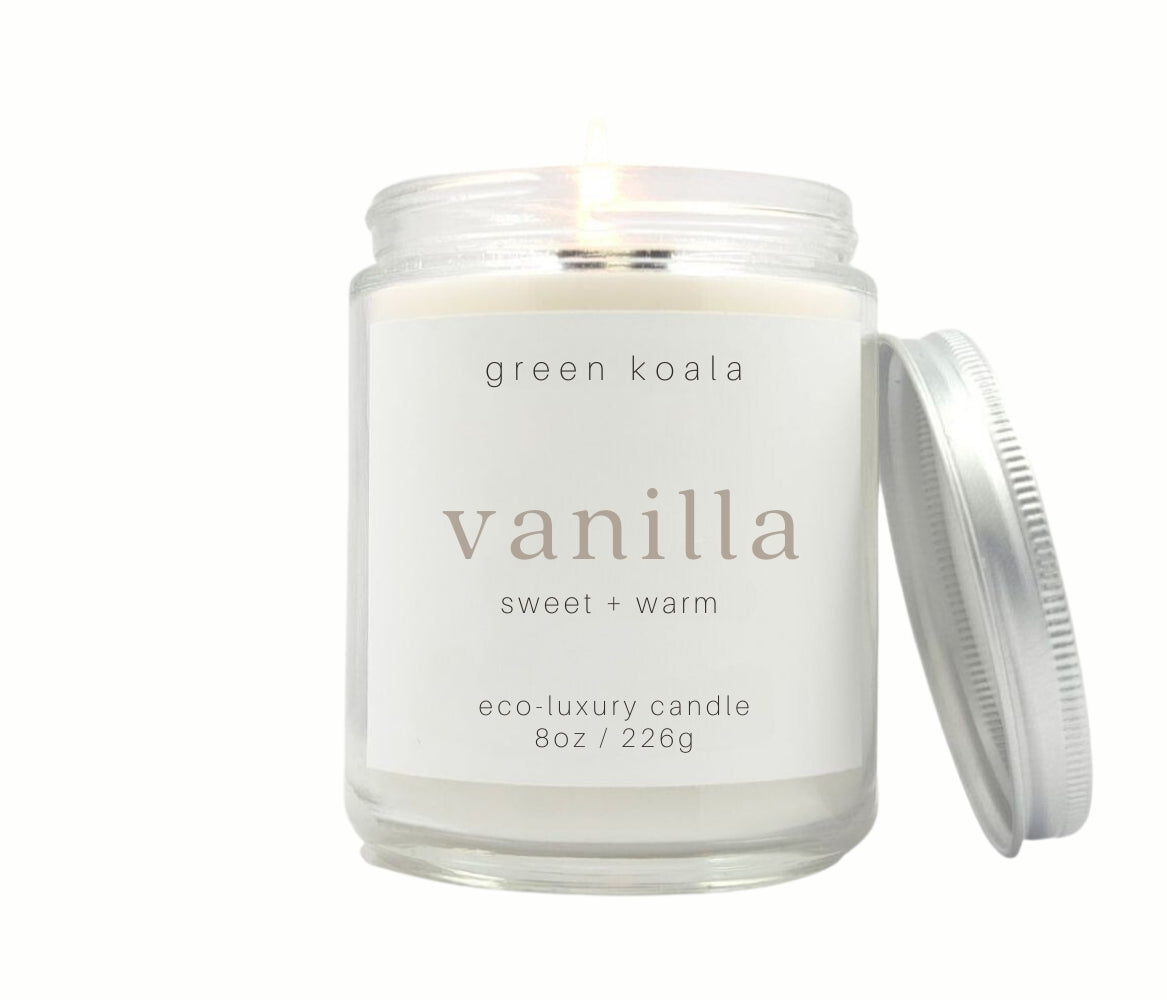 8oz Vanilla scented eco-friendly candle in a glass Jar with silver lid for a clean burn.