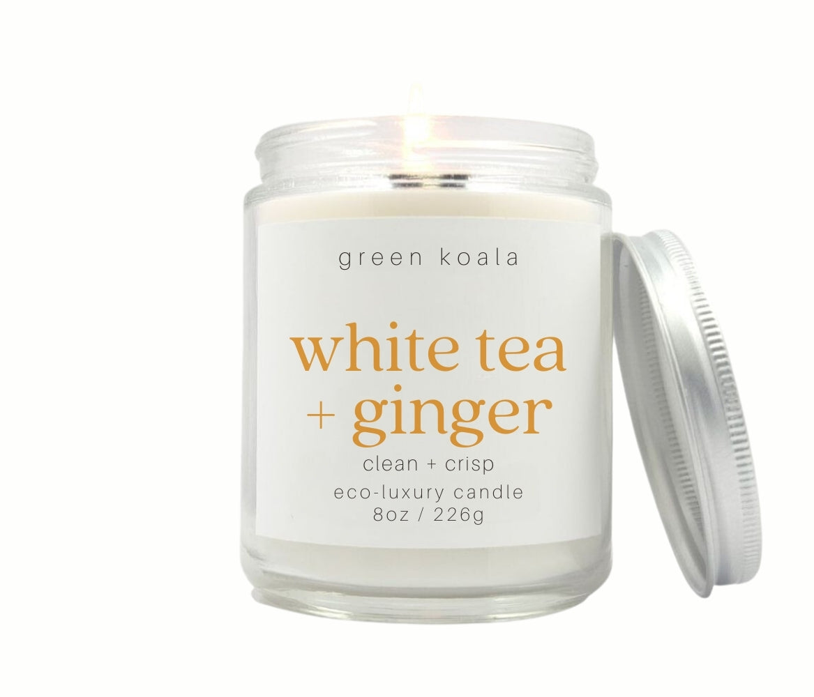 8oz White Tea & Ginger scented eco-friendly candle in a glass Jar with silver lid for a clean burn.