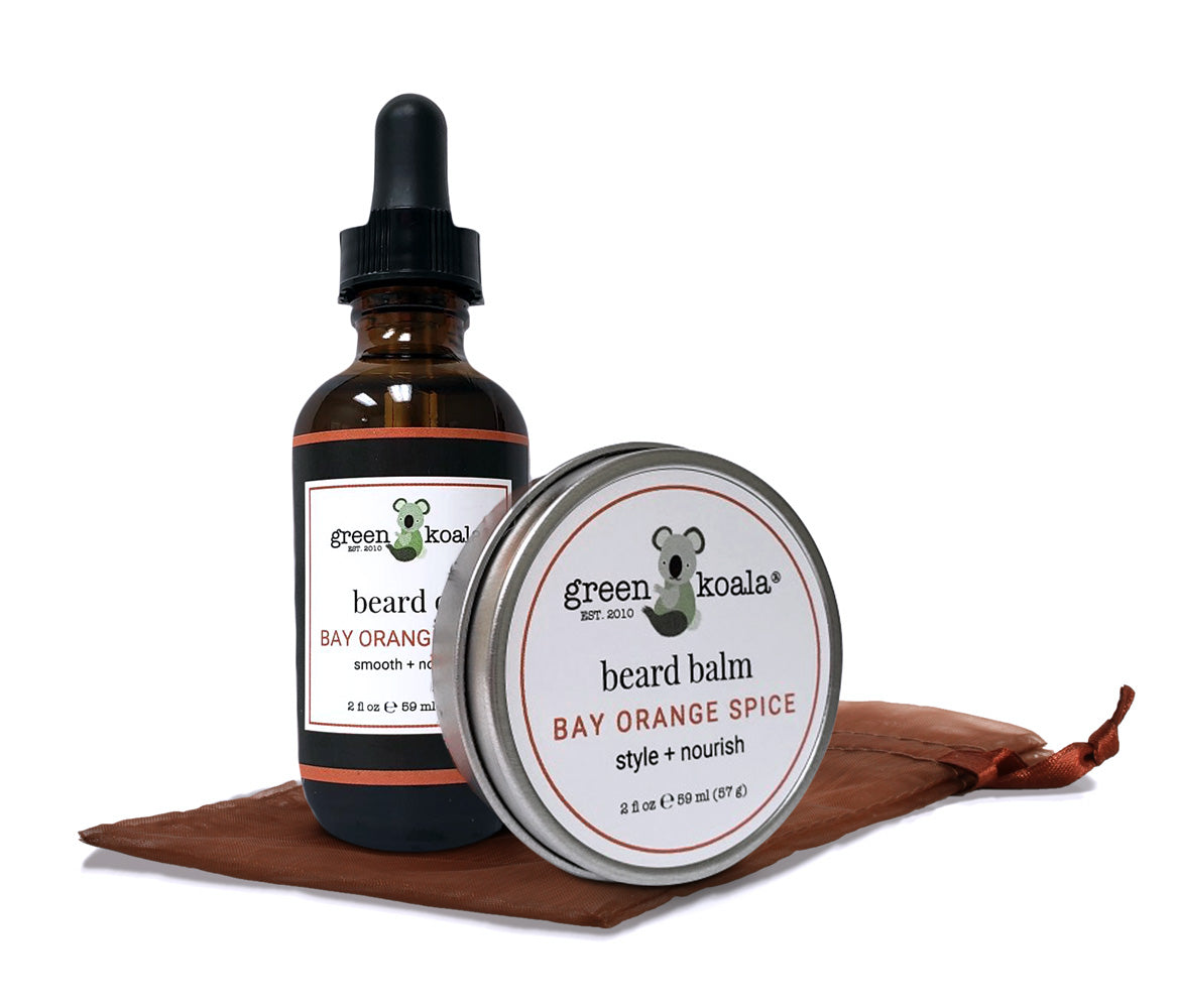 Green Koala Organic Bay Orange Spice Beard Grooming Gift Set with beard oil and beard balm in a brown organza bag.