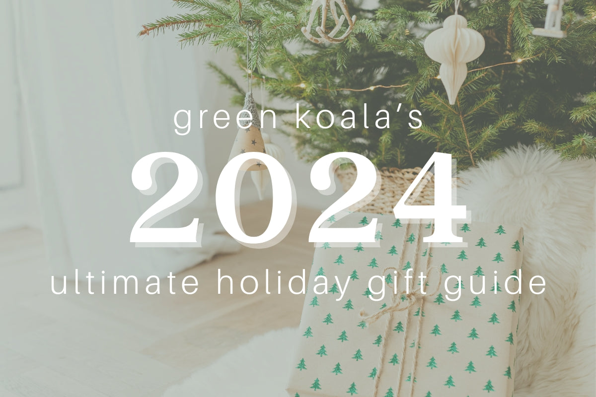 A cover image with the words: "Green Koala's 2024 Ultimate Holiday Gift Guide" placed over an image of a small gift placed under a Christmas tree.