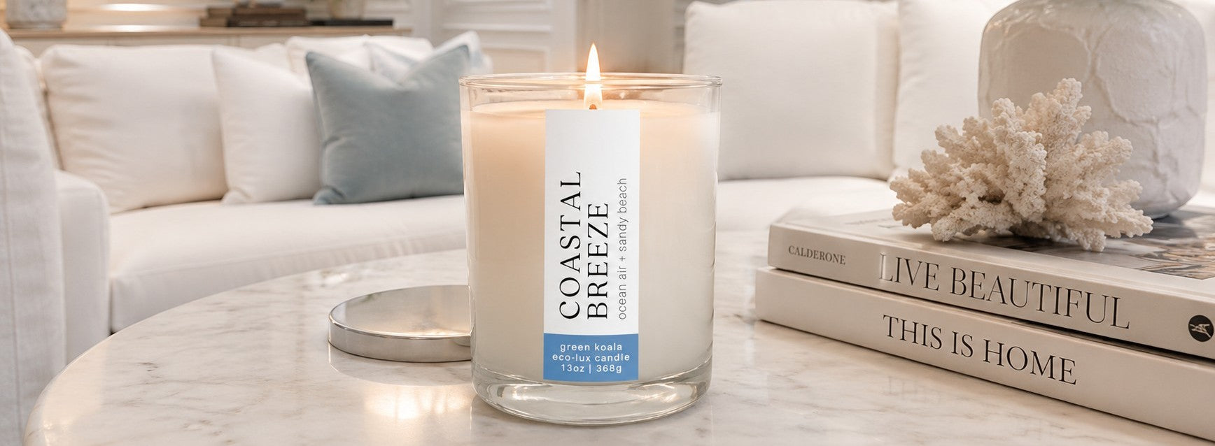 Image of stress relief candle burning on a coffee table in a living room setting. 