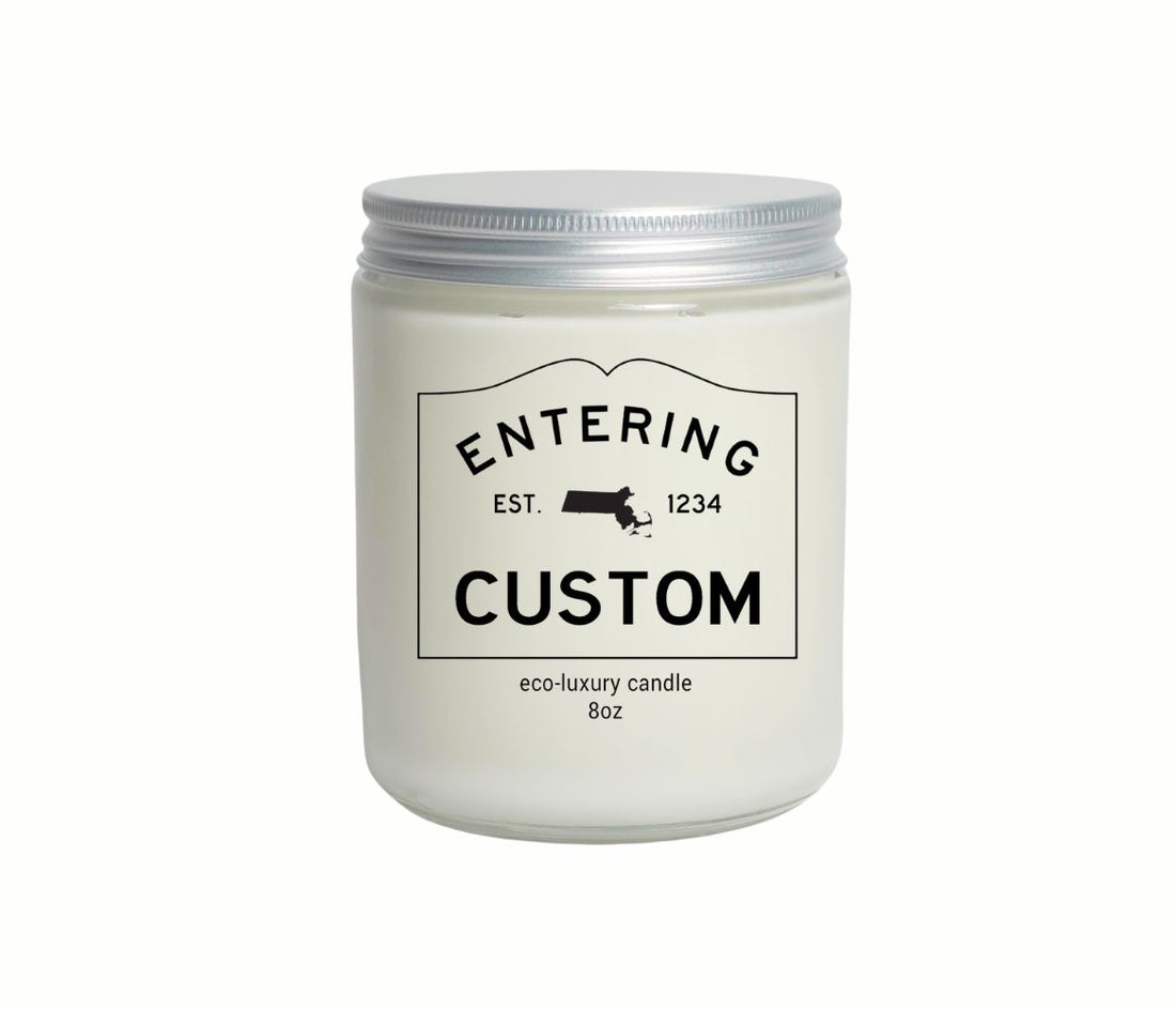 Custom 8oz “Entering” town candle with personalized label and state silhouette, hand-poured in eco-friendly coconut wax