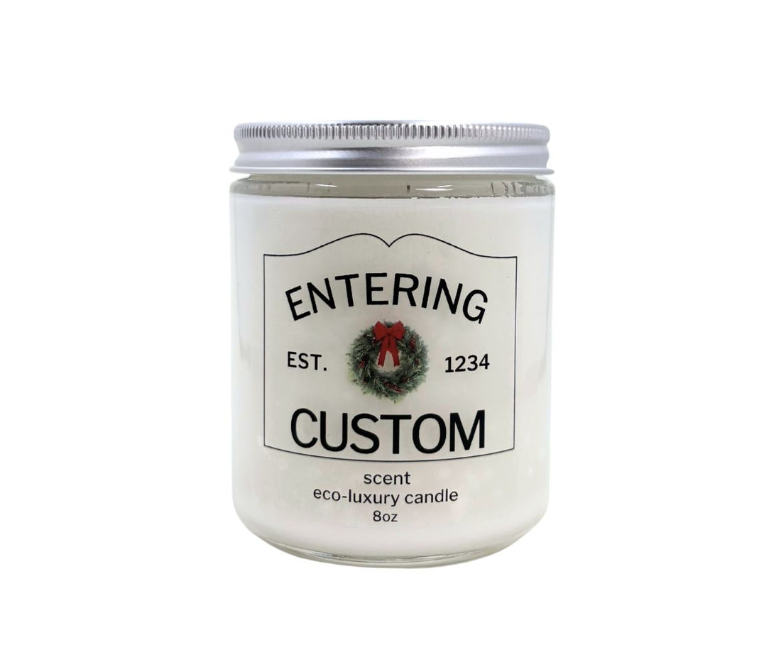 8oz Holiday “Entering Your Town” custom candle with festive wreath icon, personalized label, hand-poured in eco-friendly coconut wax