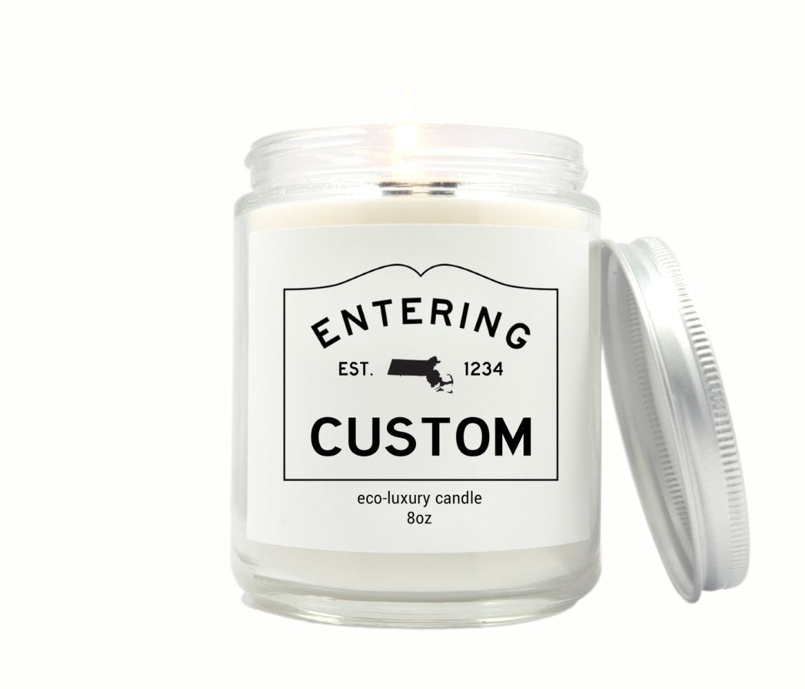 Custom 8oz “Entering” town candle with personalized label and state silhouette, hand-poured in eco-friendly coconut wax