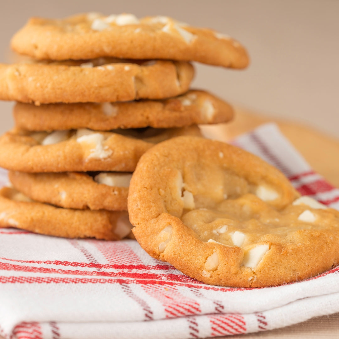 Freshly baked and warm vanilla holiday cookies in a stack.