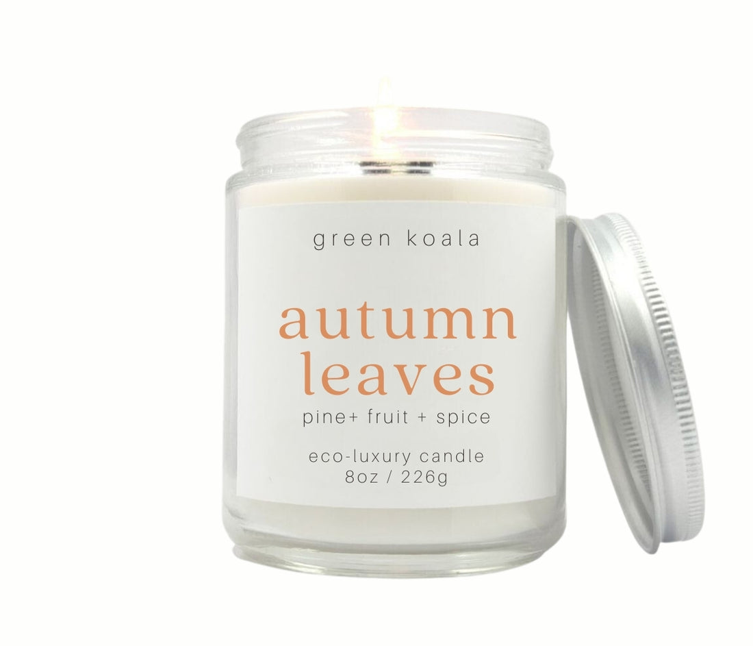 8oz Autumn Leaves coconut wax candle in a glass jar with silver lid.