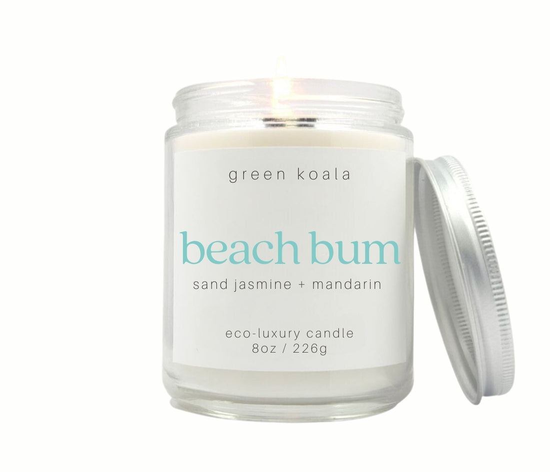 Beach Bum scented 8oz non-toxic hand poured candle in a jar with silver lid.