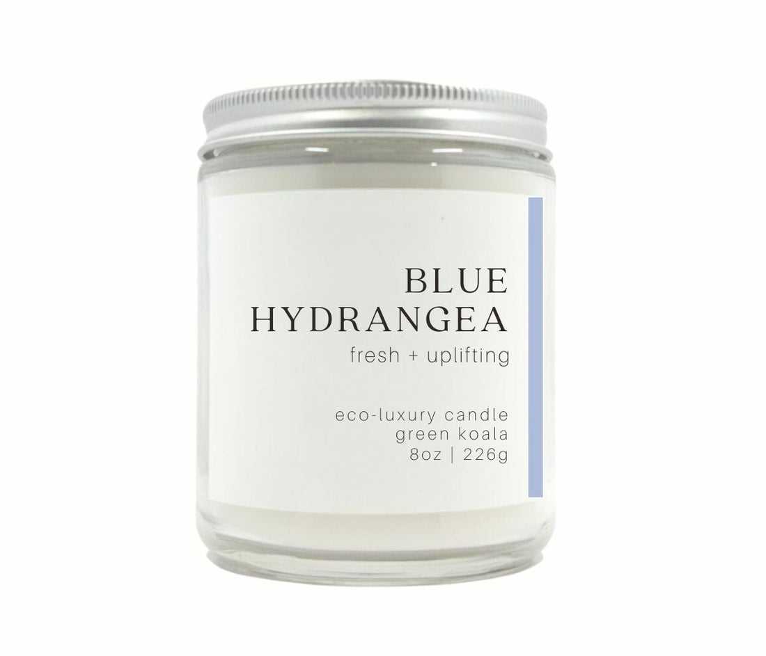 8oz Blue Hydrangea coconut wax candle in a jae with a silver lid for a clean burn. 