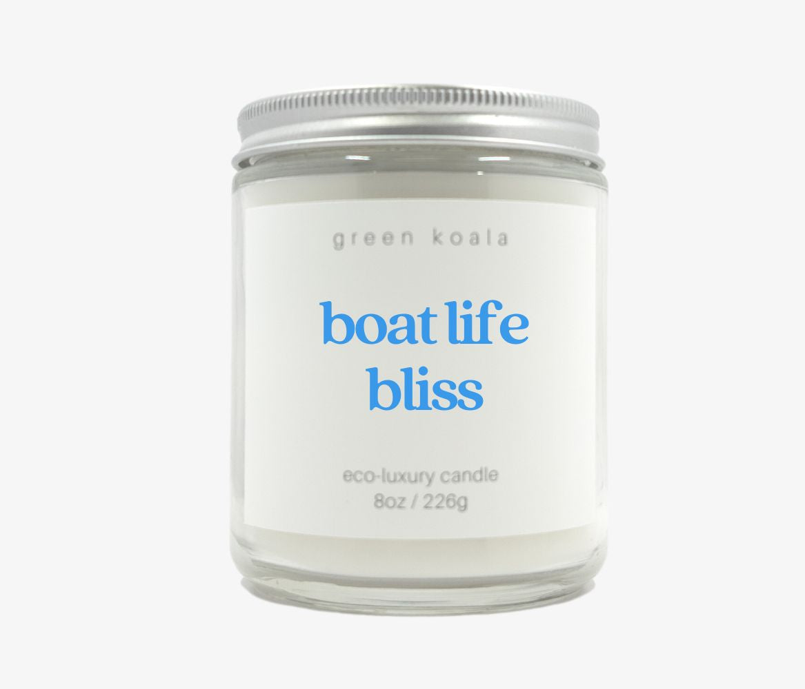 8oz Boat Life Bliss ocean scented candle in a glass jar. 