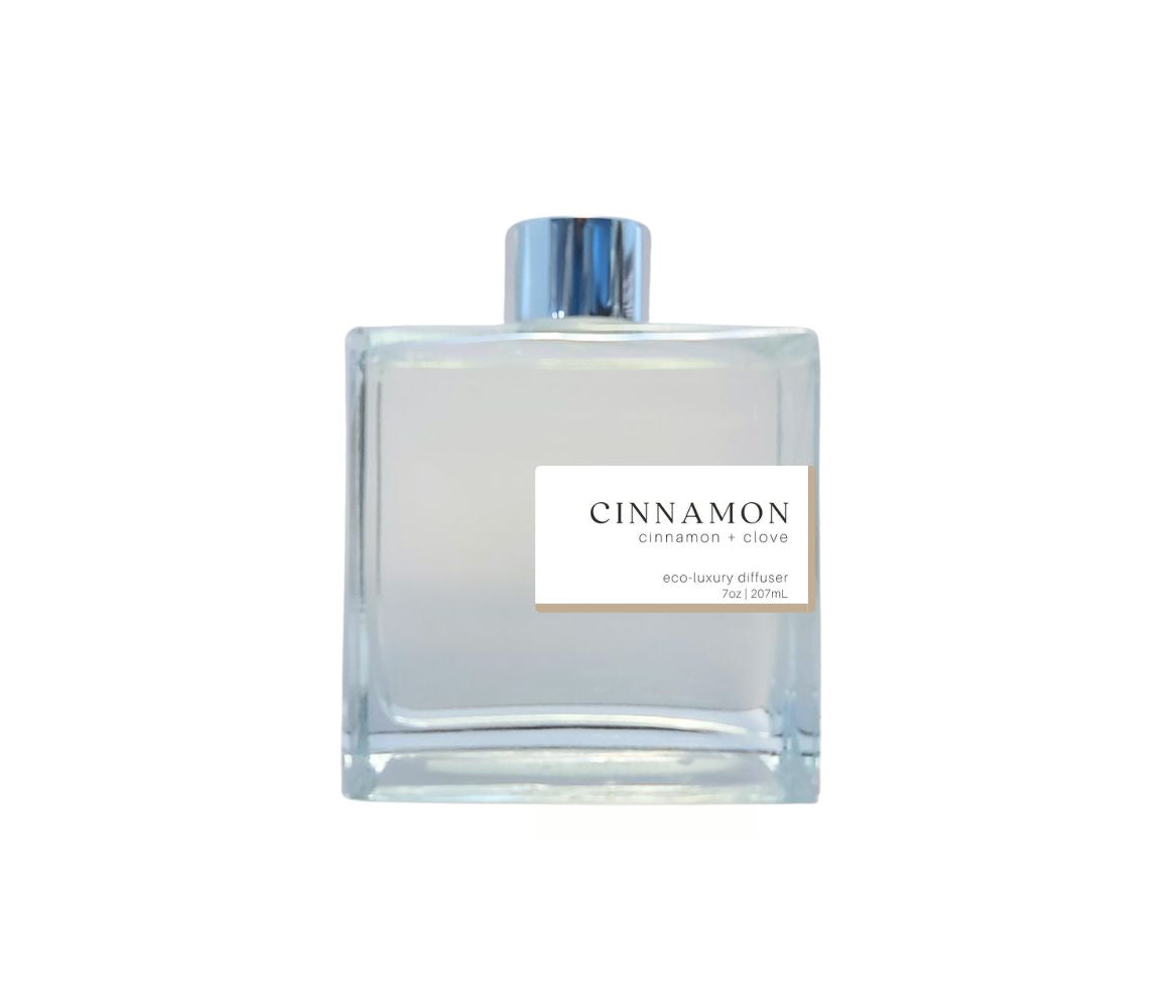 7oz Cinnamon non-toxic scented reed diffuser in glass jar.