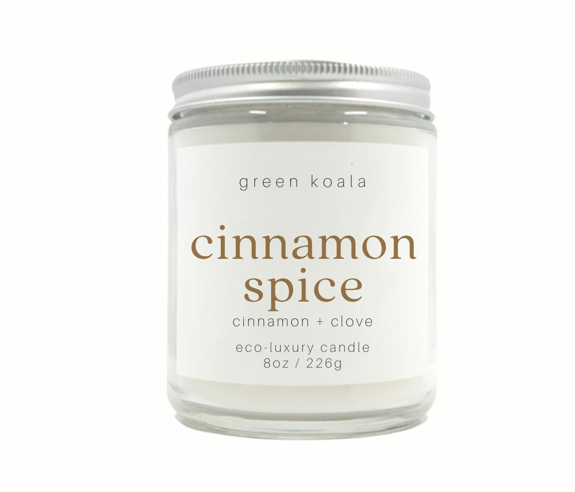 8oz Cinnamon Spice scented non-toxic handmade candle in a glass jar.